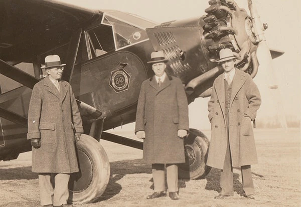 Alonzo G. Decker, Sr., S. Duncan Black, and pilot Bill Snowden